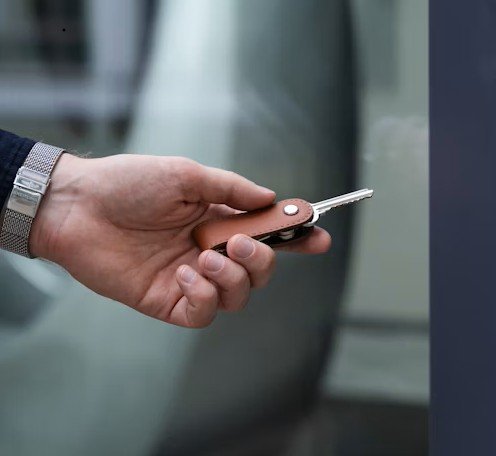 Real estate agent handing over the keys to a new owner